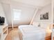 Schlafzimmer mit Doppelbett