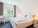 Schlafzimmer mit Doppelbett